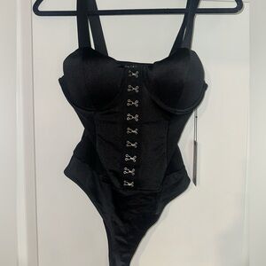 Haute Monde black bodysuit medium BNWT. Never worn. 88% poleyster 12% spandex